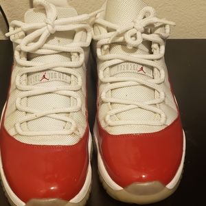Jordan's 11 low tops varsity red